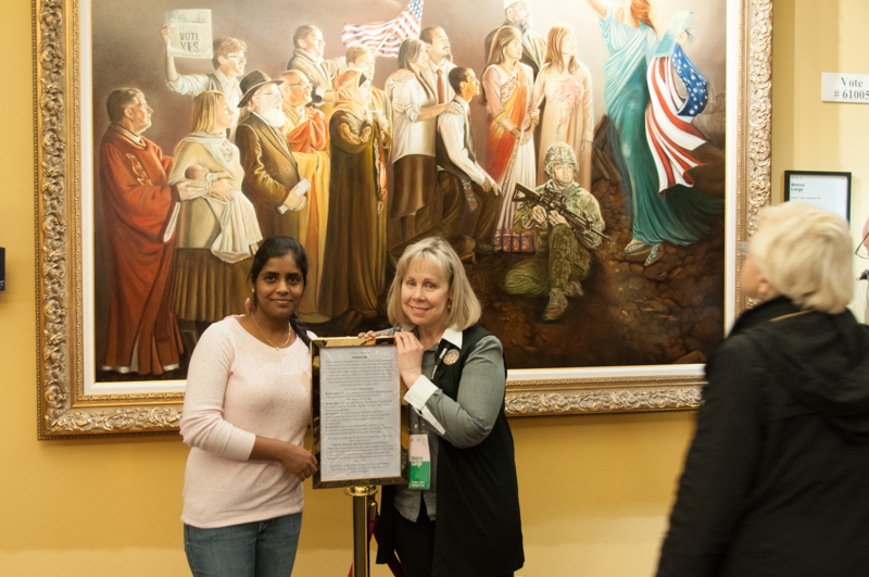 Sharon the Artist with a participant in The FREEDOM Painting